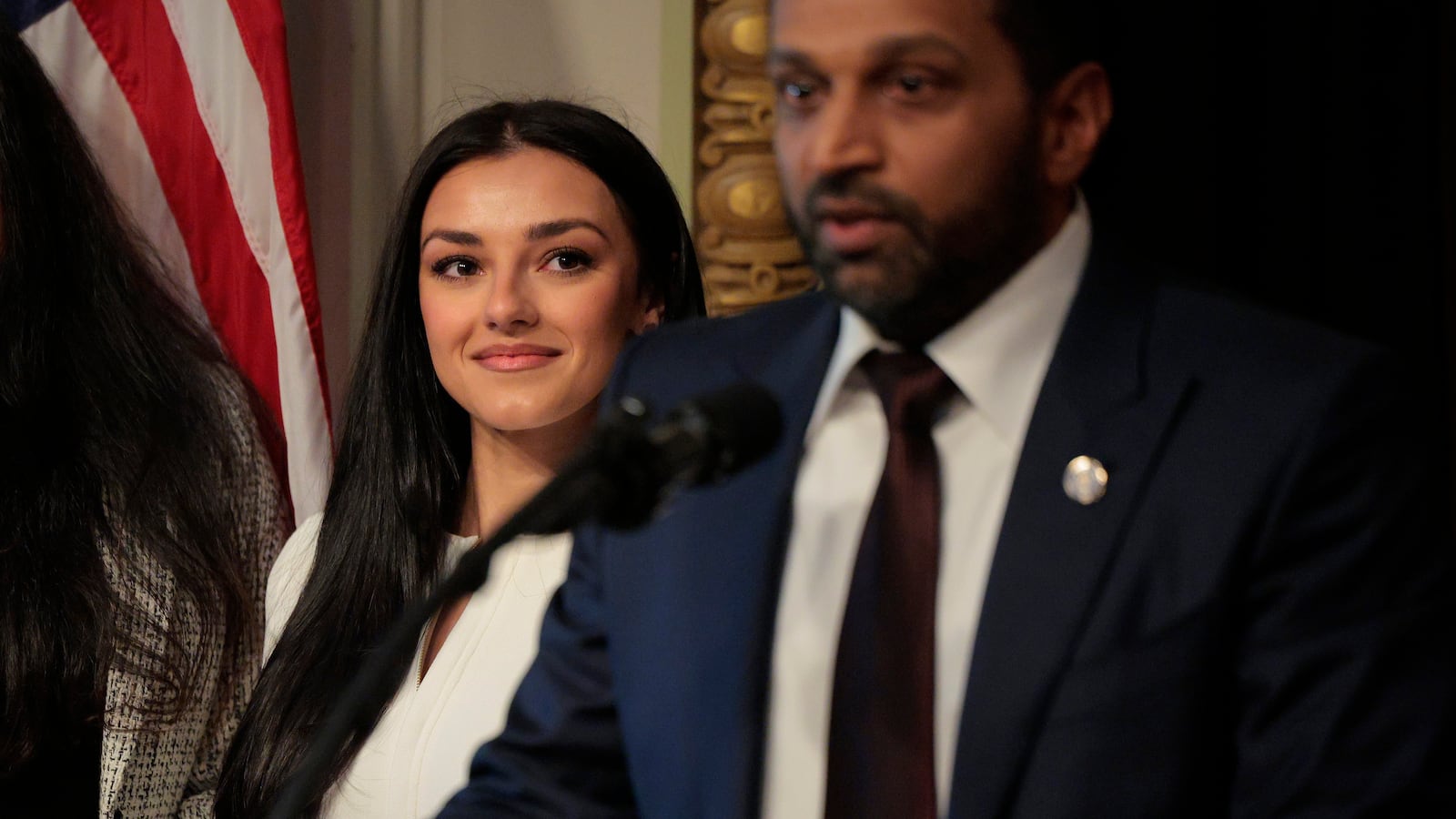 WASHINGTON, DC - FEBRUARY 21: New Federal Bureau of Investigation Director Kash Patel speaks as his girlfriend Alexis Wilkins (C) looks on during his swearing in ceremon in the Indian Treaty Room in the Eisenhower Executive Office Building on February 21, 2025 in Washington, DC. Patel was confirmed by the Senate 51-49, with Sen. Susan Collins (R-ME) and Sen. Lisa Murkowski (R-AK) the only Republicans voting to oppose him. Patel has been a hard-line critic of the FBI, the nation’s most powerful law enforcement agency. (Photo by Chip Somodevilla/Getty Images)