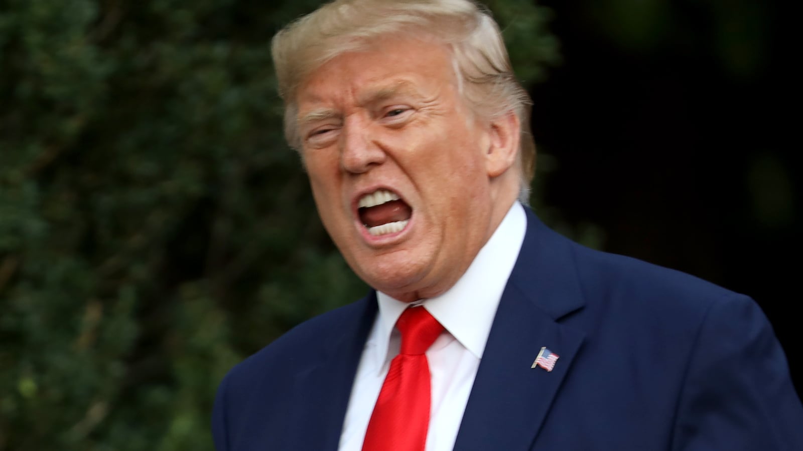 WASHINGTON, DC - OCTOBER 03: U.S. President Donald Trump shouts at members of the media as he returns to the White House on October 03, 2019 in Washington, DC. Trump traveled to Florida earlier in the day. (Photo by Win McNamee/Getty Images)
