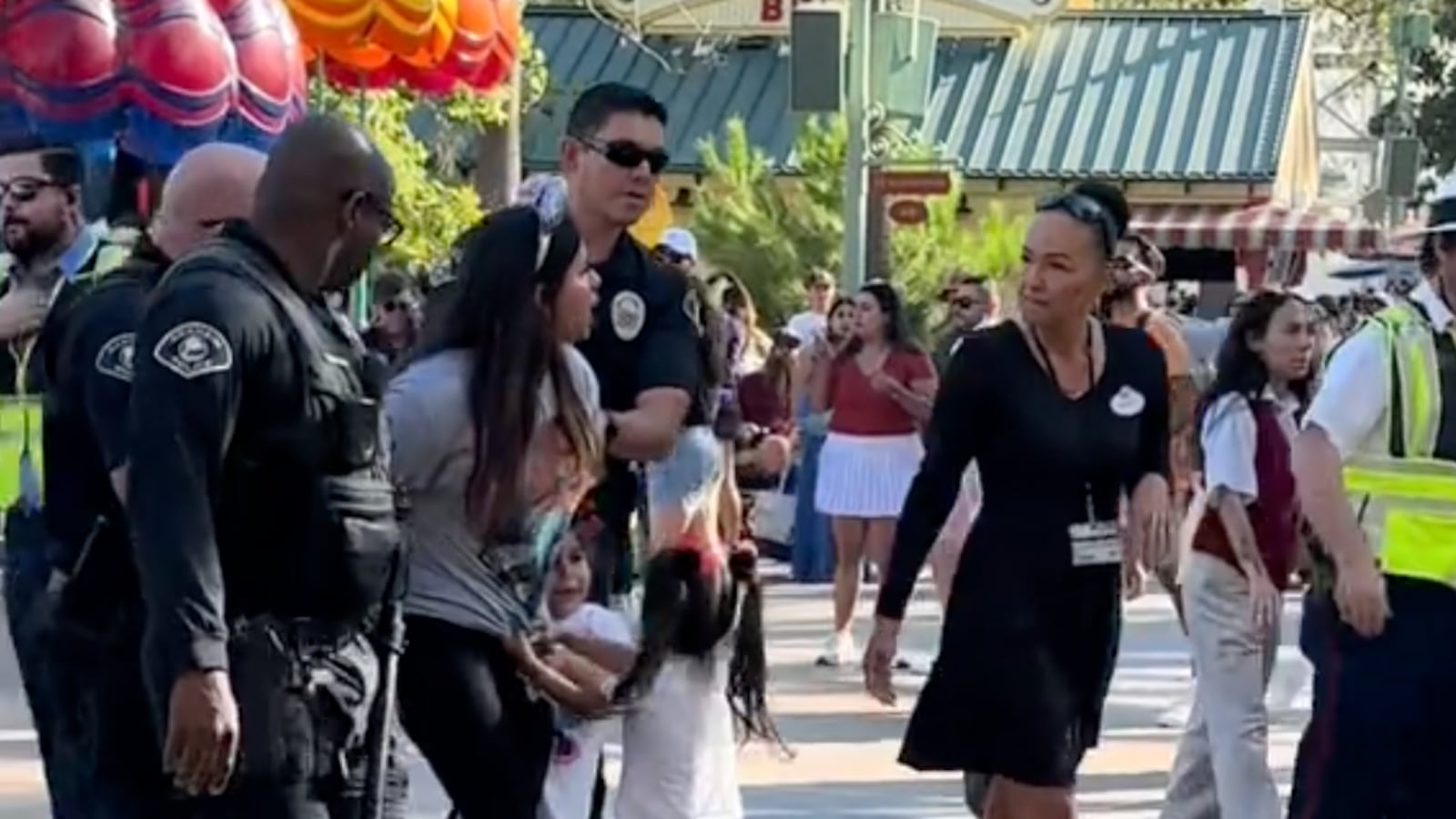 Screenshot of a viral TikTok showing a woman arrested at Disneyland.