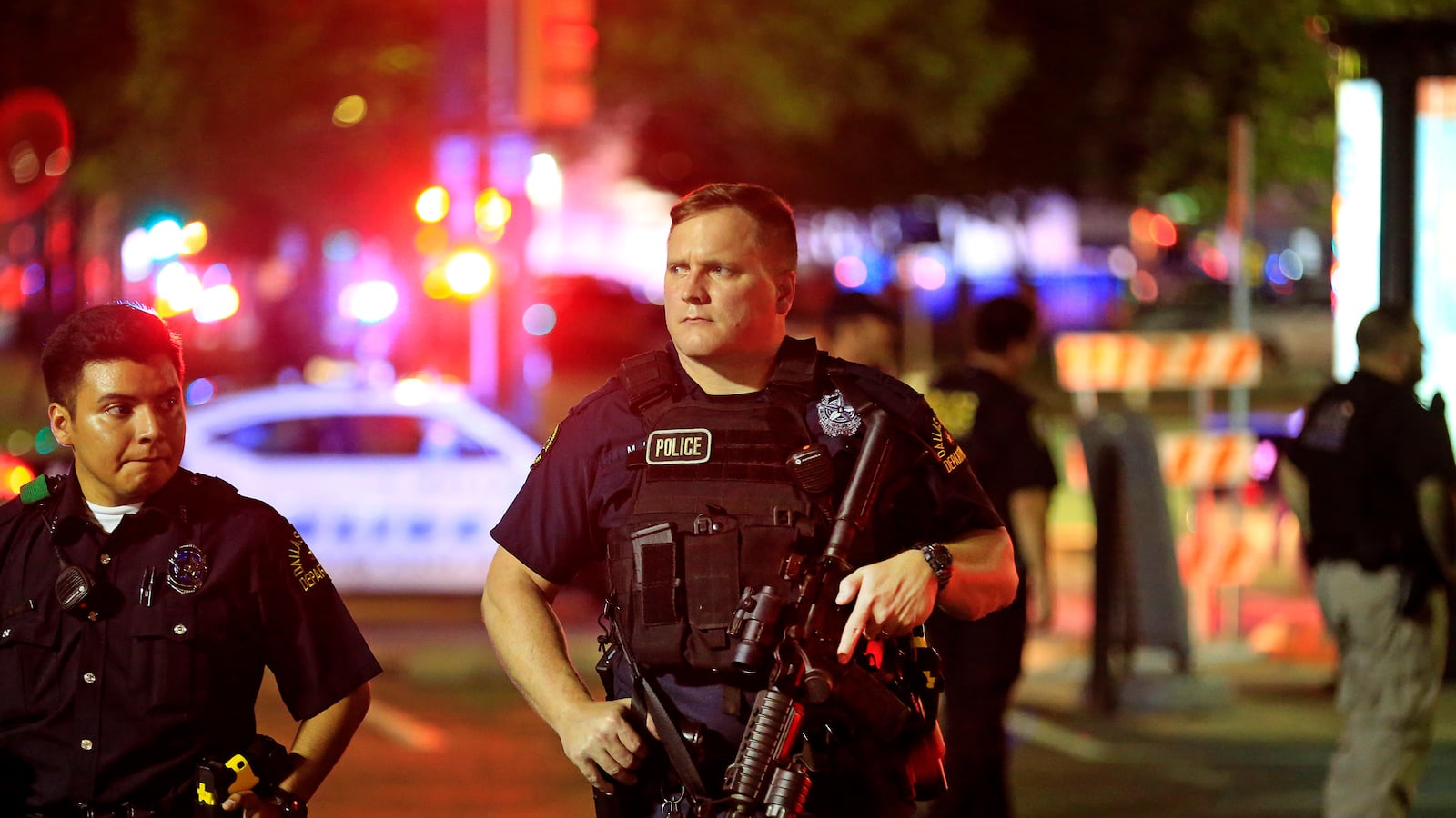 articles/2016/07/08/anger-swells-after-cops-shot-in-dallas/160708-dallas-shooting1_u0augt