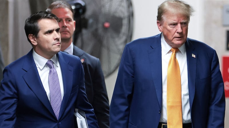 Donald Trump and his attorney Todd Blanche walk amid Trump's trial for allegedly covering up hush money payments, at Manhattan Criminal Court on May 7, 2024, in New York City.