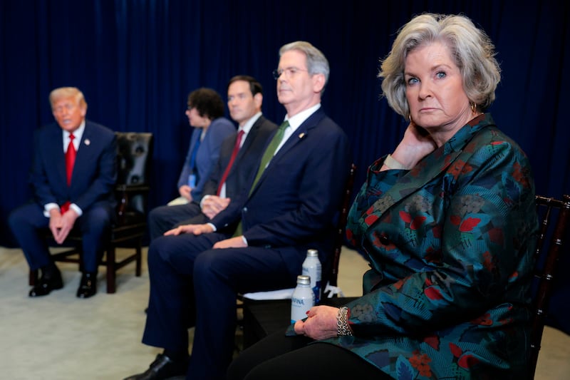 White House Chief of Staff Susie Wiles (R) attends a bilateral meeting with President of Argentina Javier Milei and U.S. President Donald Trump