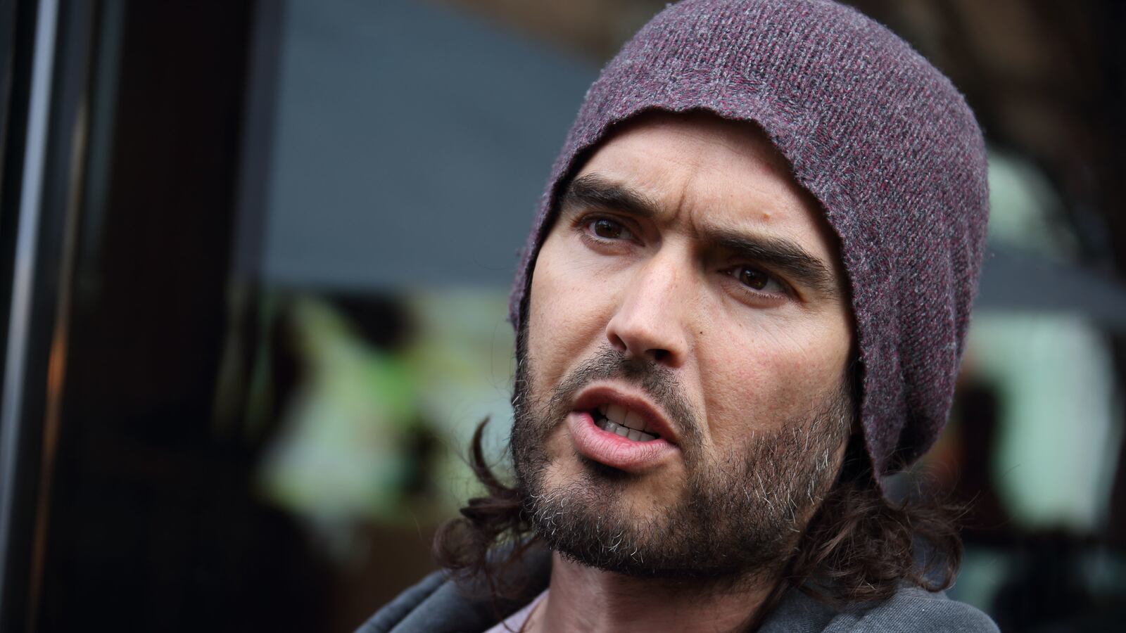 Russell Brand opens the Trew Era Cafe on March 26, 2015, in London, England.