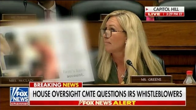 Marjorie Taylor Greene waves around Hunter Biden nudes at a Congressional hearing.