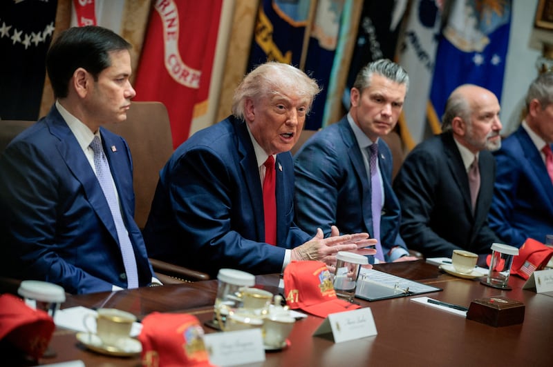 U.S. President Donald Trump speaks next to Secretary of State Marco Rubio, Defense Secretary Pete Hegseth and Commerce Secretary Howard Lutnick during a cabinet meeting in the Cabinet Room at the White House, in Washington, D.C., U.S., May 27, 2026. REUTERS/Evan Vucci