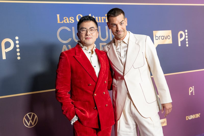 LOS ANGELES, CALIFORNIA - JULY 17: (L-R) Bowen Yang and Matt Rogers arrive at the Las Culturistas Culture Awards at The Orpheum Theatre on July 17, 2025 in Los Angeles, California. (Photo by Emma McIntyre/WireImage)