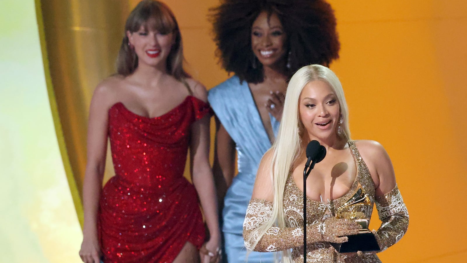 Beyoncé accepts the Best Country Album award for “Cowboy Carter” from Taylor Swift