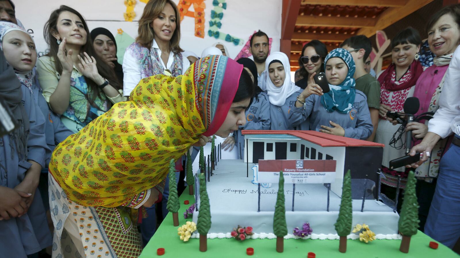 cheats/2015/07/12/malala-opens-school-on-18th-birthday/150712-malala-yousafzai-cheat_mth048