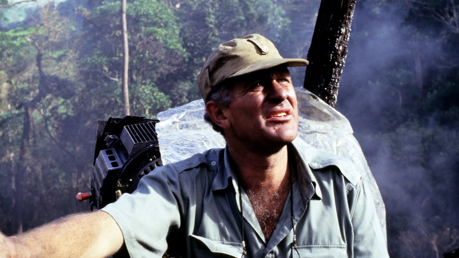 English film director John Irvin on the set of his Vietnam war movie 'Hamburger Hill' filmed in the Philippine jungle south of Manila, 4th November 1986. (Photo by Alex Bowie/Getty Images)