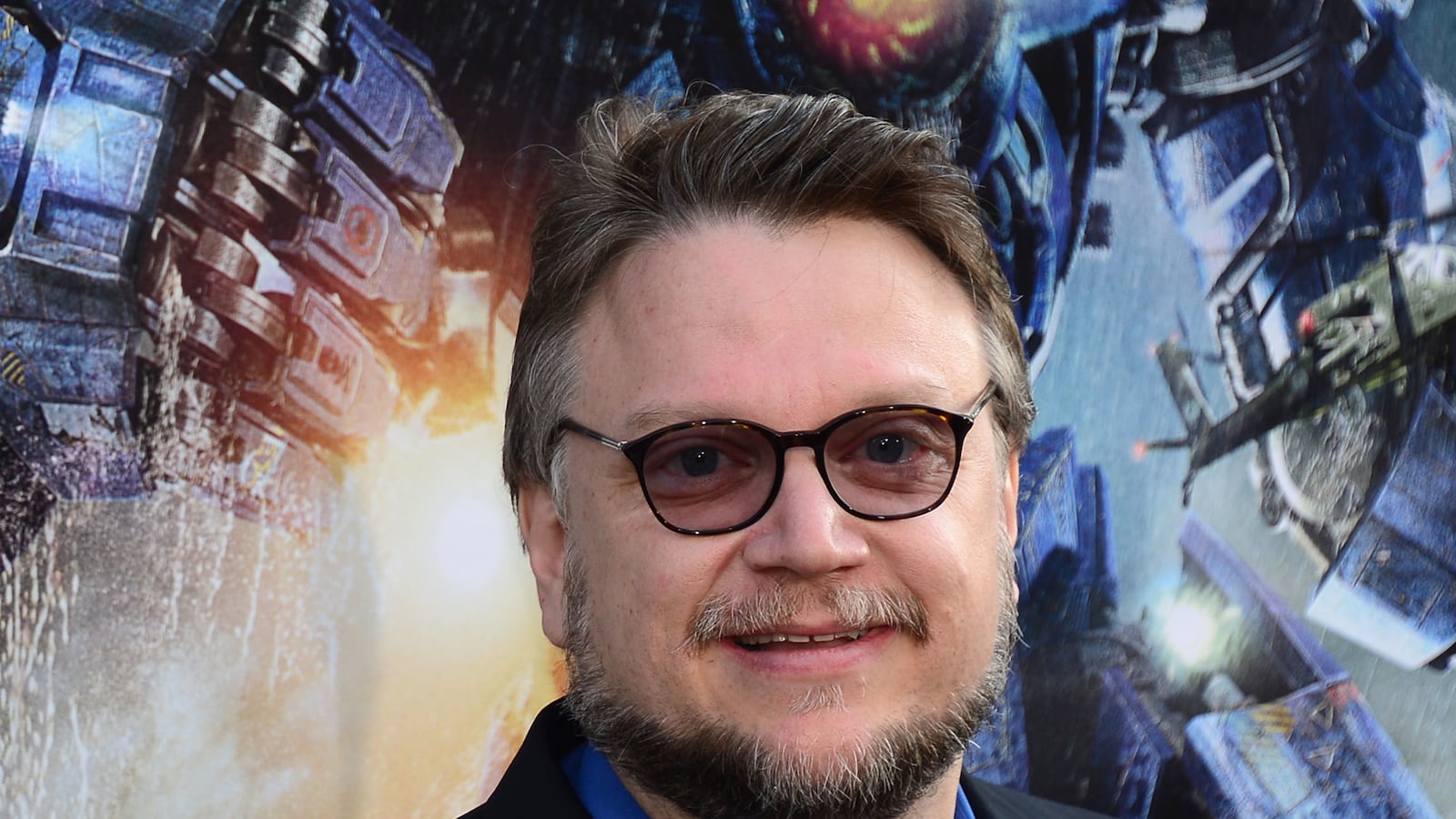 articles/2014/07/17/guillermo-del-toro-on-hardcore-gothic-crimson-peak-and-pacific-rim-2/140716-romano-deltoro-tease_sia3lr