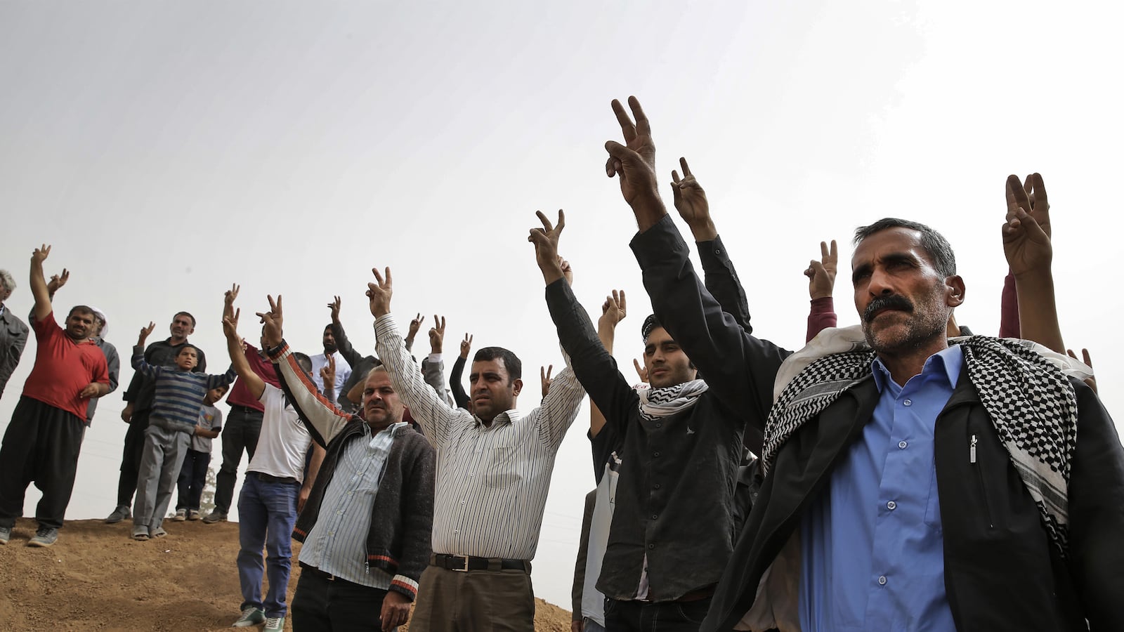 articles/2014/11/08/remembering-kobani-before-the-siege/141107-abdi-kobani-fall-tease_vftbl9