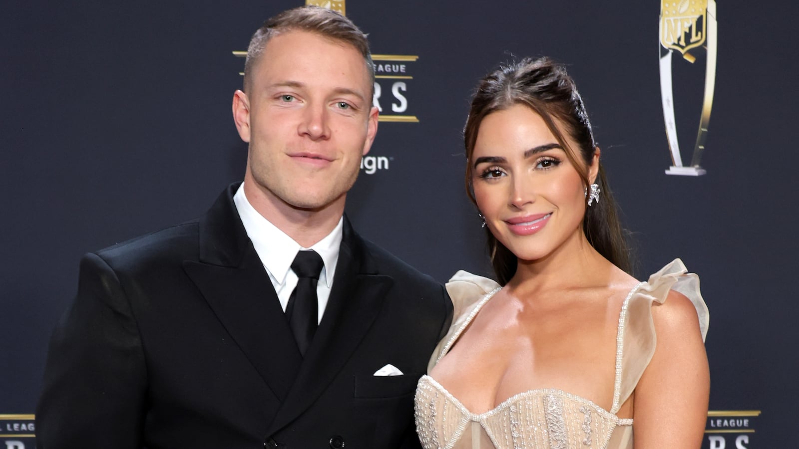 Christian McCaffrey and Olivia Culpo.