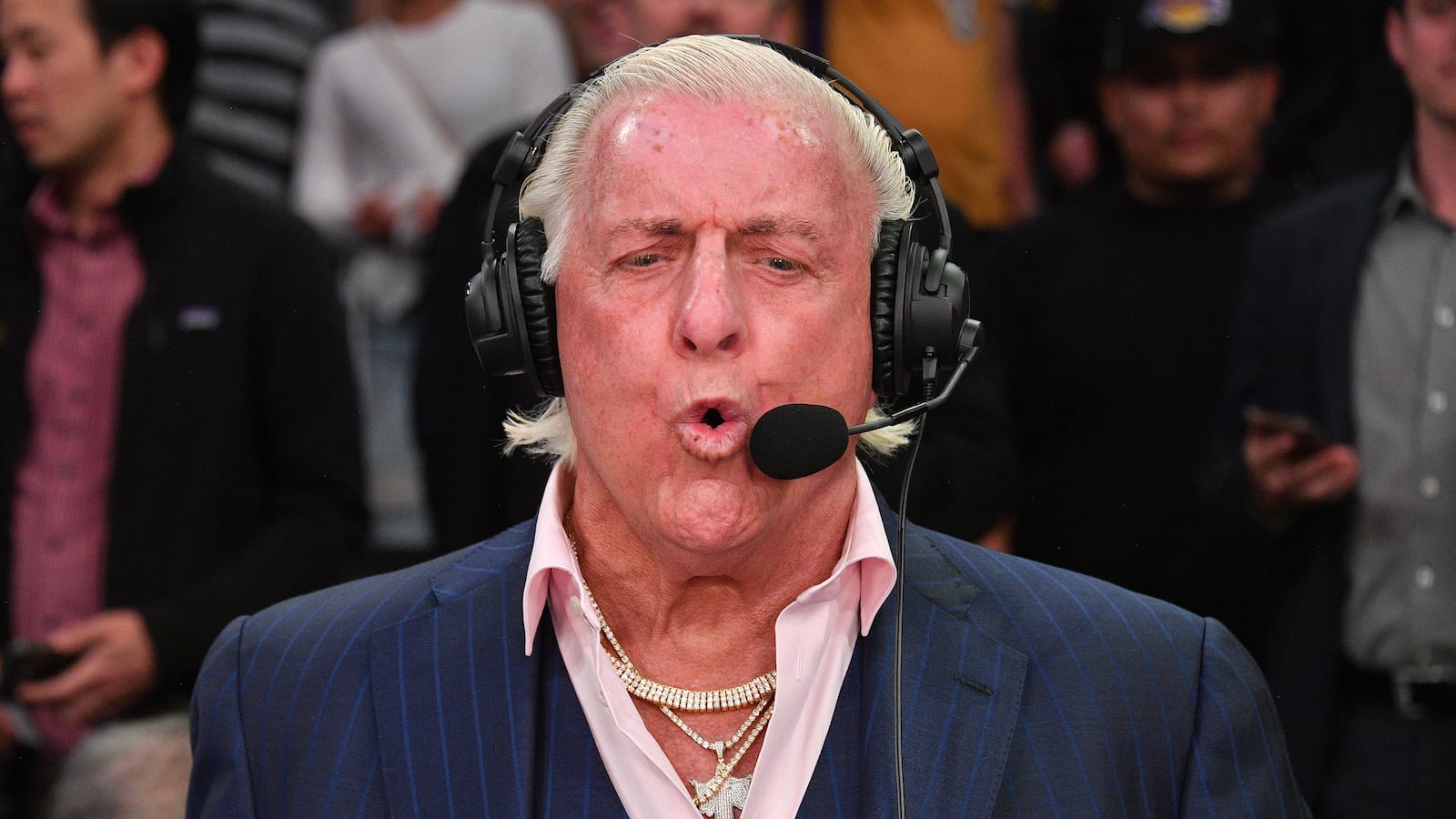 LOS ANGELES, CALIFORNIA - FEBRUARY 25: Ric Flair joins a telecast during a basketball game between the Los Angeles Lakers and the New Orleans Pelicans at Staples Center on February 25, 2020 in Los Angeles, California. (Photo by Allen Berezovsky/Getty Images)