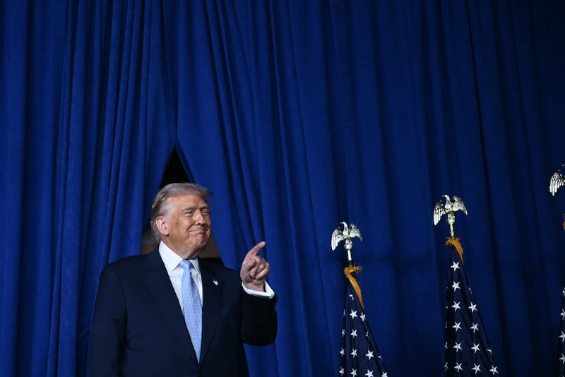 President Donald Trump arrives to deliver remarks at the McDonald's Impact Summit in Washington, D.C. on November 17, 2025.
