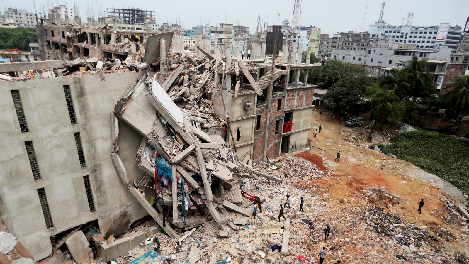 cheats/2013/04/28/collapsed-building-owner-captured/130428-bangladesh-building-collapse-cheat_d3pvrp