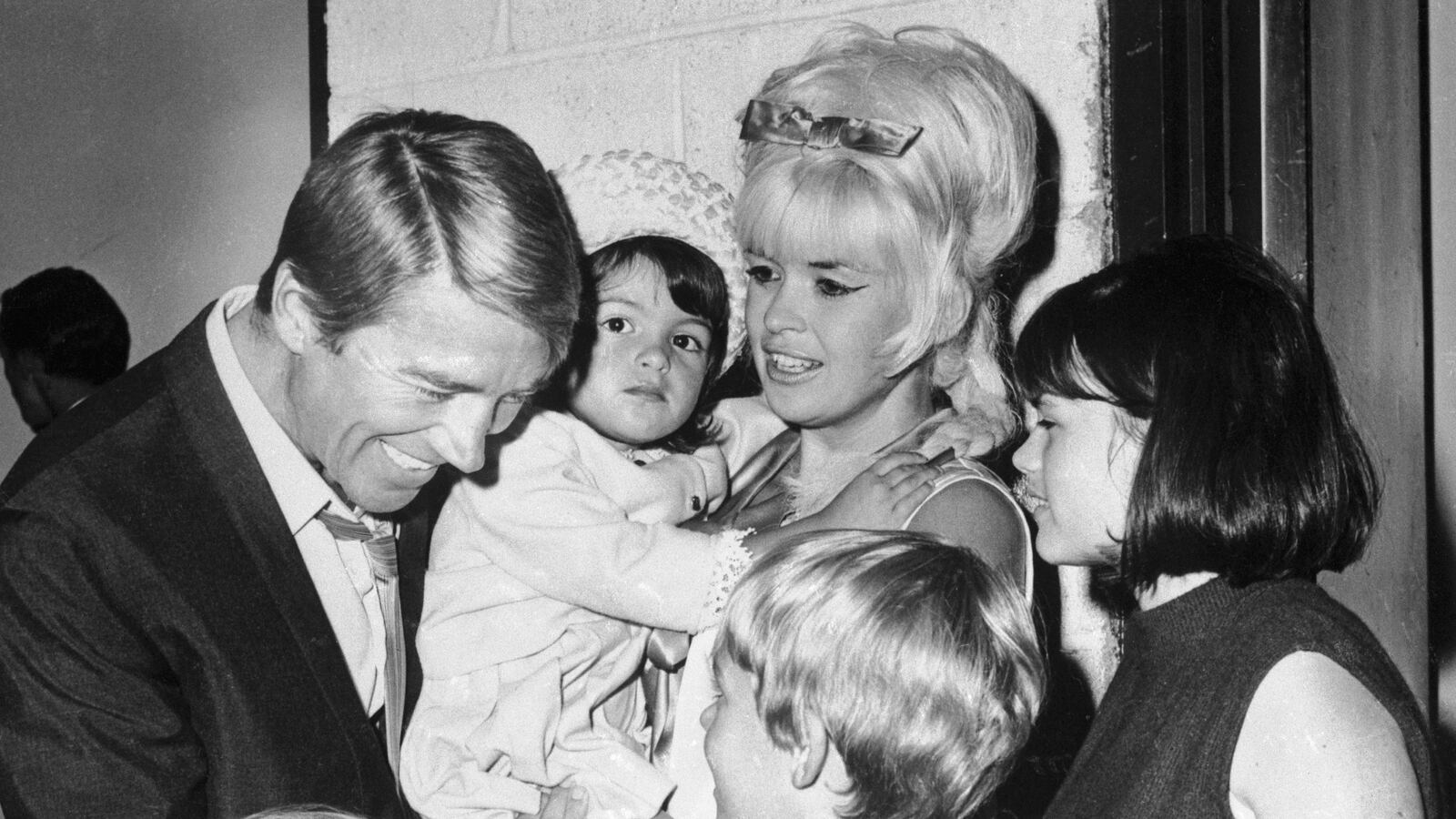 Actor Mickey Hargitay is obviously enjoying his reunion with his former wife, actress Jayne Mansfield, and their children July 19th, backstage at the Westbury, L. I. Music Fair, where Miss Mansfield opened in Gentlemen Prefer Blondes.