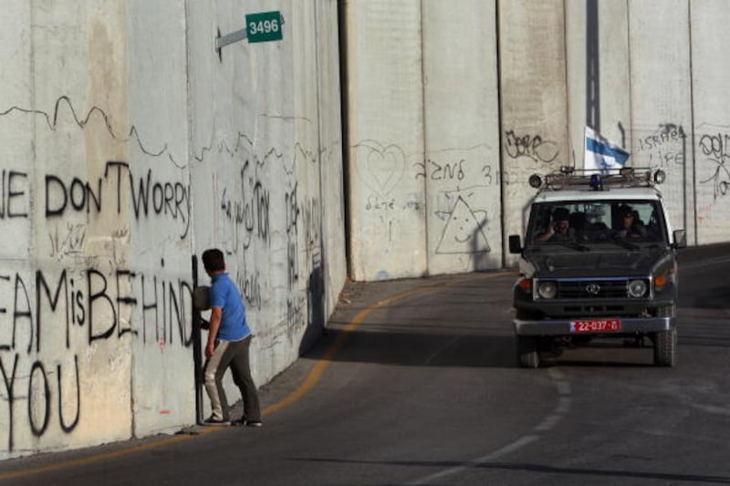 articles/2012/12/19/why-academic-boycotts/wall-soccer-openz_jsjbkr