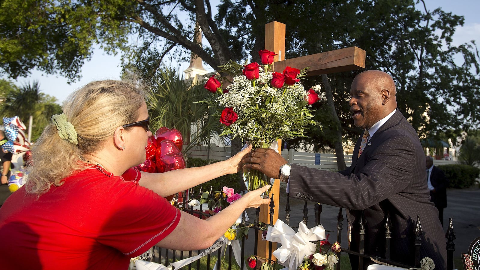 articles/2015/06/21/mother-emanuel-comforts-her-children/150621-Davis-Emanuel-Tease_msgfal