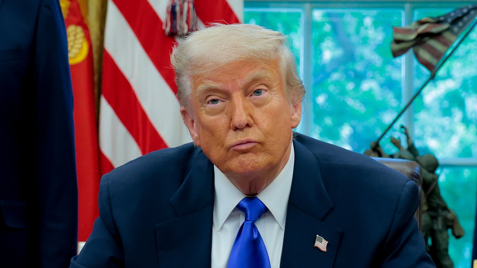 WASHINGTON, DC - MAY 05: U.S. President Donald Trump takes a question from a reporter in the Oval Office at the White House on May 05, 2025 in Washington, DC. Trump signed new proclamations and executive orders, including one that ends federal funding for so-called "gain-of-function" studies, which explores the use of microorganisms to alter biological functions in the aid of gene products. (Photo by Anna Moneymaker/Getty