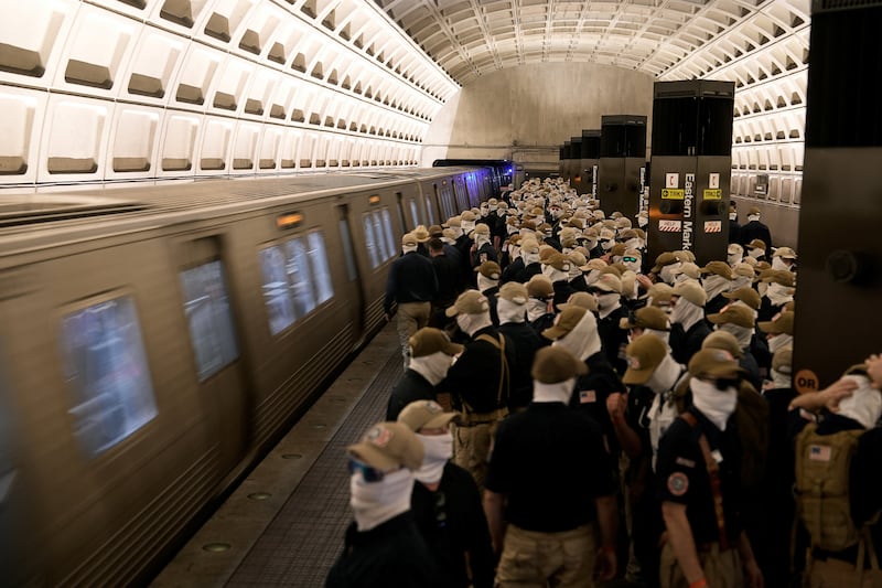 Members of the group Patriot Front wait to board the Metro, on the 250th anniversary of U.S. independence in Washington, D.C., U.S., July 4, 2026.