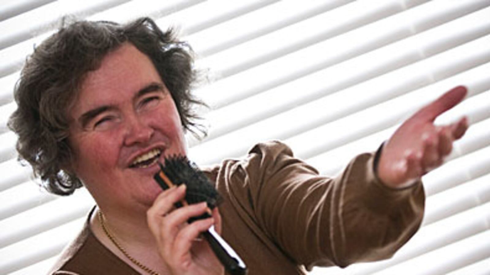 cheats/2009/05/12/susan-boyle-dishes-to-oprah/susan-boyle-1_yaooii