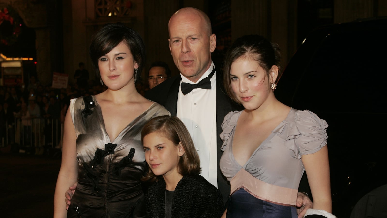 Bruce Willis with daughters Rumer, Tallulah, and Scout.