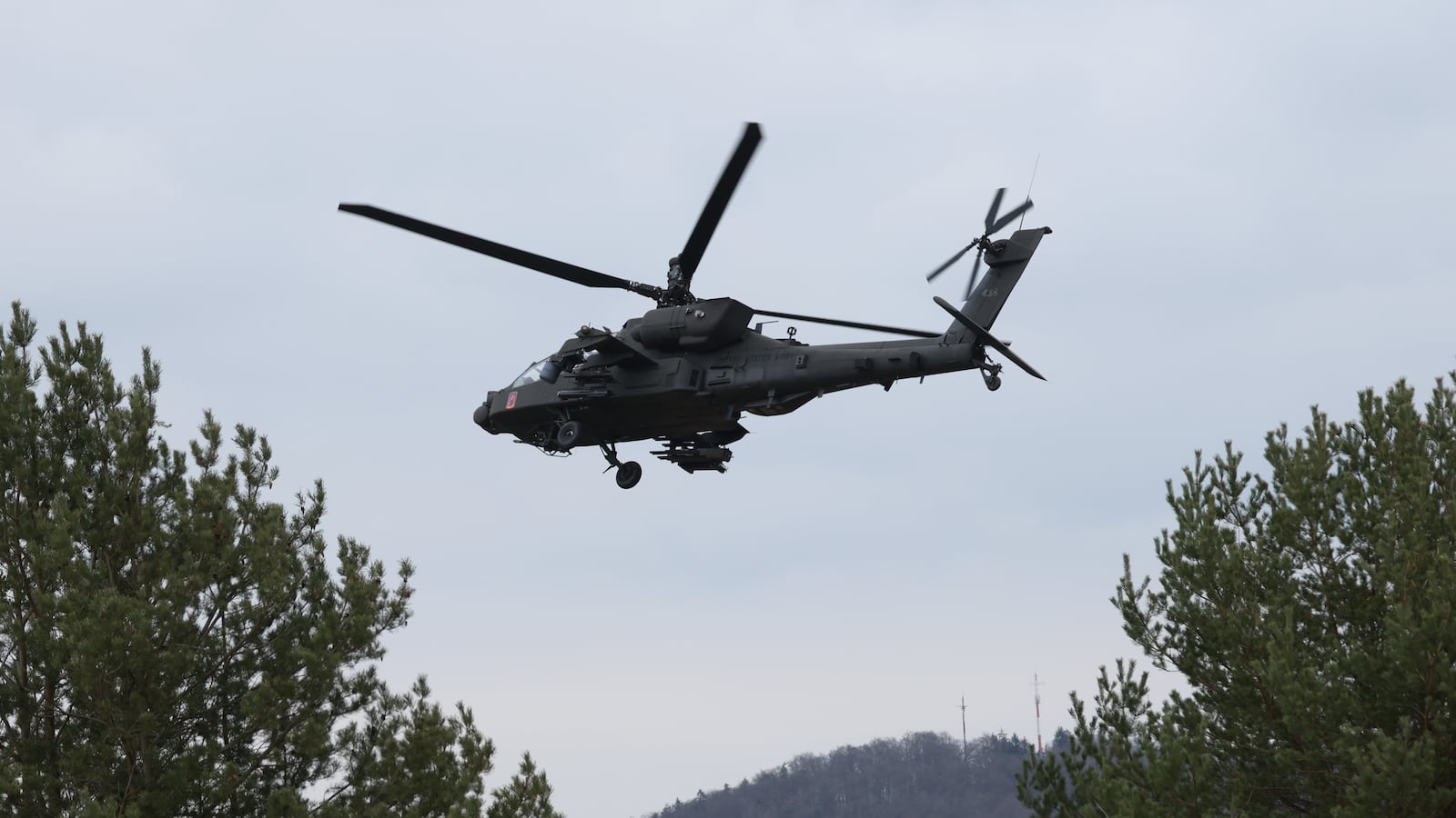 HOHENFELS, GERMANY - MARCH 12: A Boeing AH-64 Apache attack helicopter of the U.S. Army 12th Combat Aviation Brigade participates in the Allied Spirit 25 military exercise at the U.S. 7th Army Training Command Joint Multinational Readiness Center on March 12, 2025 near Hohenfels, Germany. Approximately 3,000 troops from NATO member countries, including the United States, Austria, the Czech Republic, France, Hungary, Italy, Spain, Latvia, Lithuania, North Macedonia, Slovakia, Slovenia and the United Kingdom, are participating in the four-week exercise with the aim of improving interoperability. European countries have pledged large-scale defence spending following doubts cast by the administration of U.S. President Donald Trump on the future of the U.S. commitment to the NATO military alliance. (Photo by Sean Gallup/Getty Images)