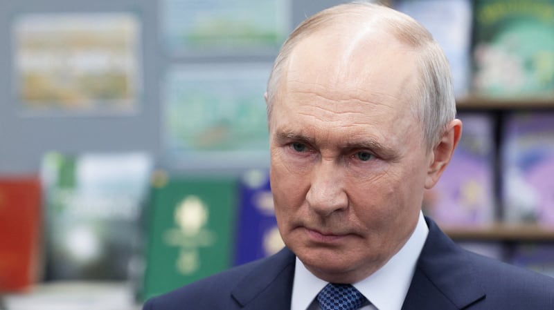 Russian President Vladimir Putin attends a meeting