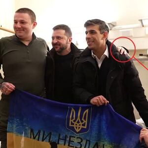 Russia's Foreign Ministry published photos it claims show the Ukrainian president has a "There is no God" tattoo. 