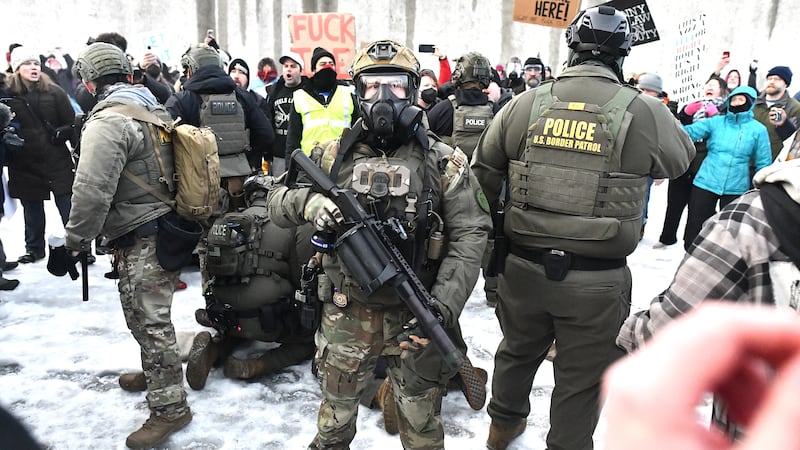 Protestors clash with federal agents outside the Bishop Henry Whipple Federal Building in Saint Paul, Minnesota