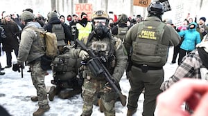 Protestors clash with federal agents outside the Bishop Henry Whipple Federal Building in Saint Paul, Minnesota