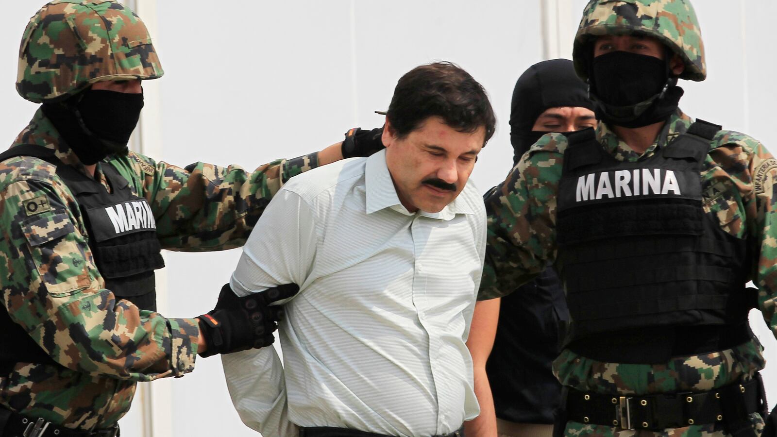 articles/2014/02/24/captured-mexico-s-cartel-kingpin-el-chapo/140224-el-chapo-sullivan-tease_mr6loi