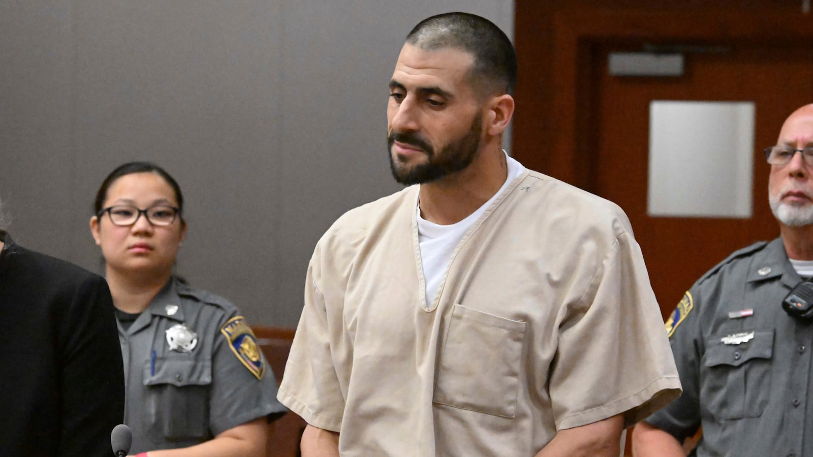 FILE - Dennis Hernandez, the troubled brother of the late New England Patriots tight end Aaron Hernandez, stands with his public defender Sandra Crowell during his arraignment, Aug. 1, 2023, at Connecticut Superior Court in New Britain, Conn.