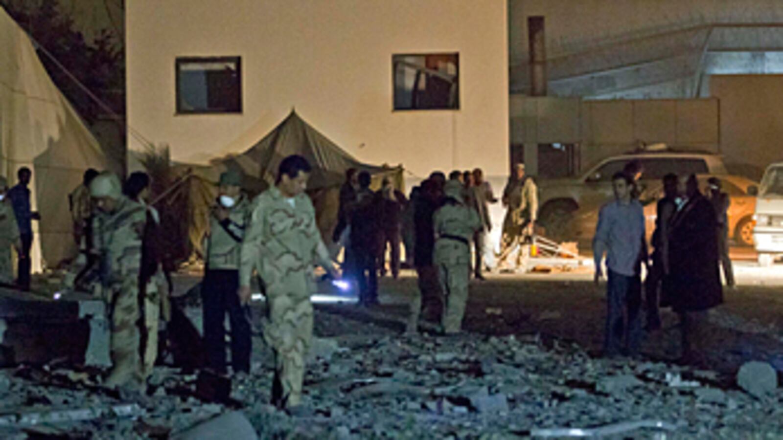 cheats/2011/04/25/gaddafi-still-in-high-spirits/nato-airstrike-gaddafi-compound_tfz3lf