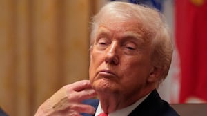 WASHINGTON, DC - DECEMBER 02: U.S. President Donald Trump looks on during a meeting of his Cabinet in the Cabinet Room of the White House on December 02, 2025 in Washington, DC. A bipartisan Congressional investigation has begun regarding Secretary of War Pete Hegseth's role in ordering U.S. military strikes on small boats in the waters off Venezuela that have killed scores of people, which Hegseth said are intended "to stop lethal drugs, destroy narco-boats and kill the narco-terrorists who are poisoning the American people.” (Photo by Chip Somodevilla/Getty Images)