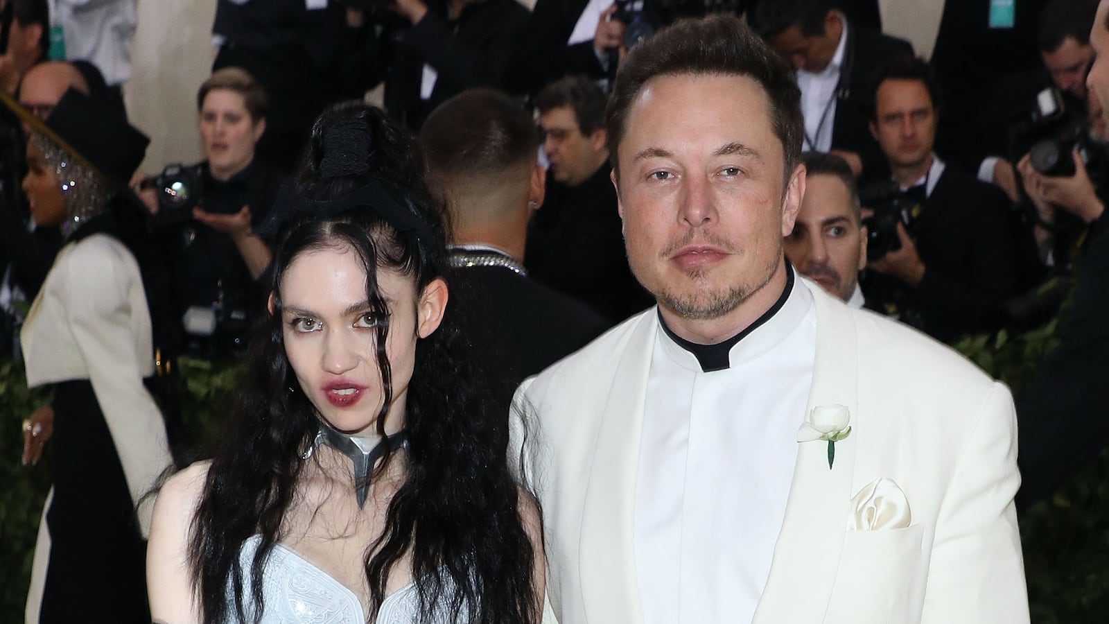 NEW YORK, NY - MAY 07: Grimes and Elon Musk attend "Heavenly Bodies: Fashion & the Catholic Imagination", the 2018 Costume Institute Benefit at Metropolitan Museum of Art on May 7, 2018 in New York City. (Photo by Taylor Hill/Getty Images)