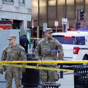 Law enforcement responds to a shooting near the Farragut West WMATA Metro station in Washington, on November 26, 2025.