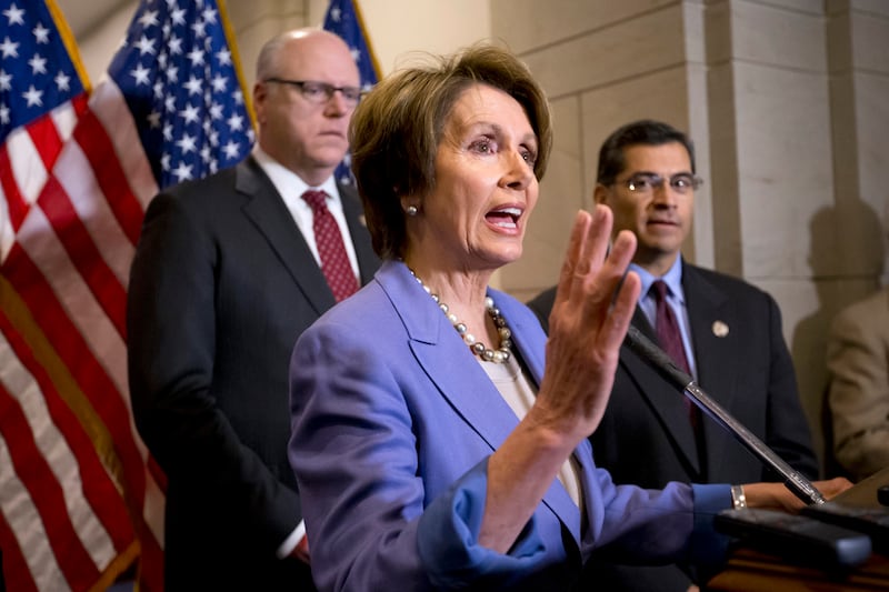 articles/2013/01/02/congress-s-fiscal-cliff-chaos-house-passes-last-minute-deal/nancy-pelosi-speaks-fiscal-cliff_qt221r