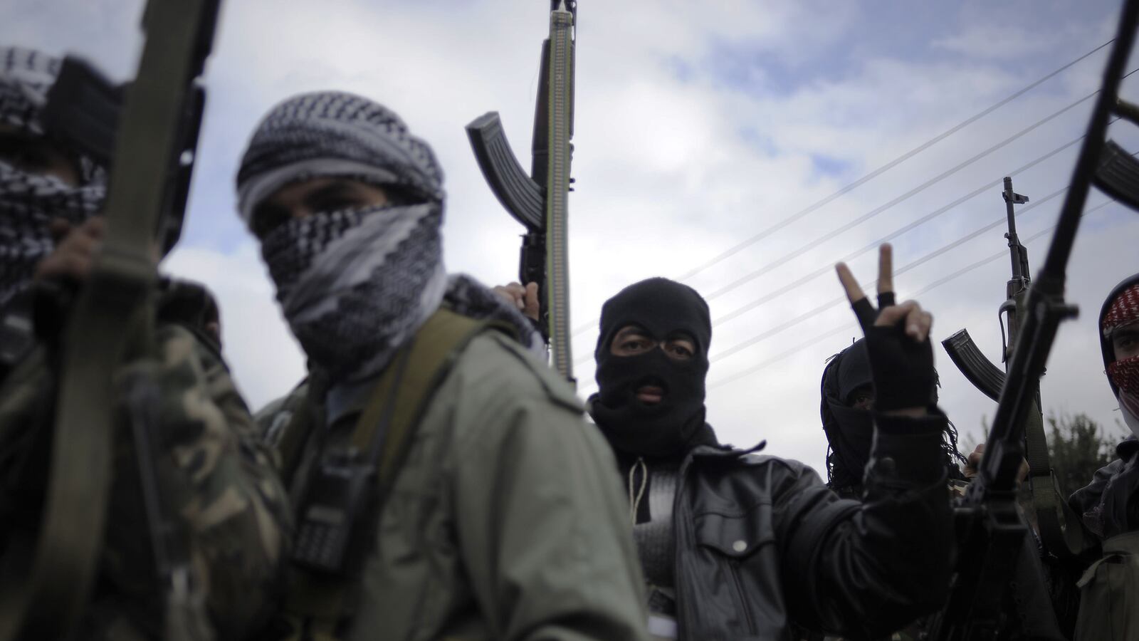 articles/2014/09/16/syrian-opposition-blasts-reports-it-signed-a-truce-with-isis/140915-rogin-syria-tease_yezwzs