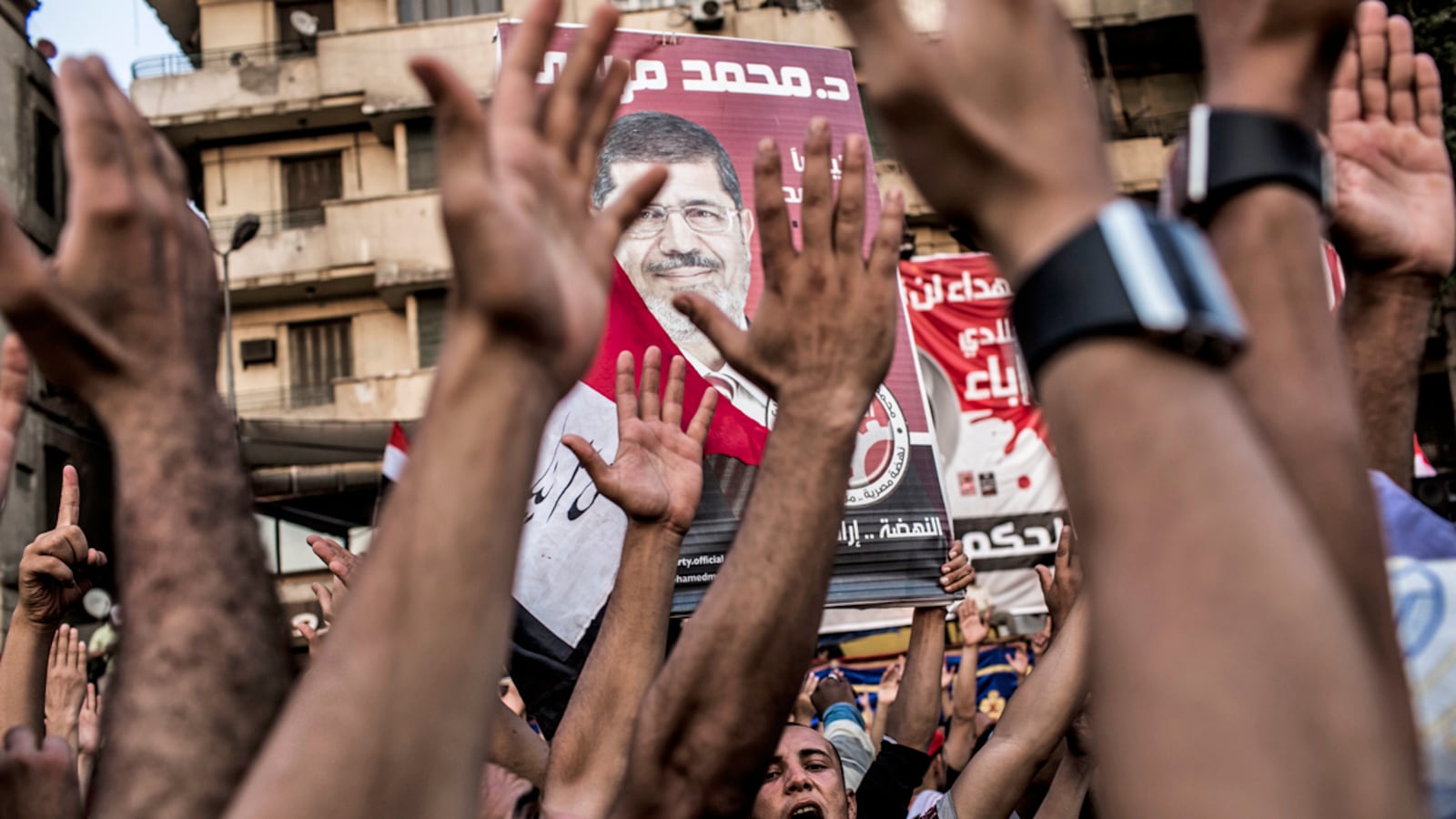 articles/2012/06/25/islamist-mohamed-morsi-wins-egyptian-election-inside-tahrir-square/egypt-muslim-brotherhood-banco_g8ryc5