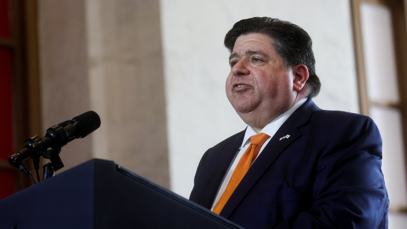 J.B. Pritzker speaks on the day U.S. President Joe Biden delivers an economic policy speech