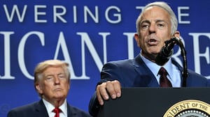 Nevada Governor Joe Lombardo (R) speaks as US President Donald Trump looks on during an event where Trump is promoting his administration's recent tax-relief initiative at Red Rock Casino Resort and Spa in Las Vegas, Nevada, on August 5, 2026. (Photo by Jim WATSON / AFP via Getty Images)
