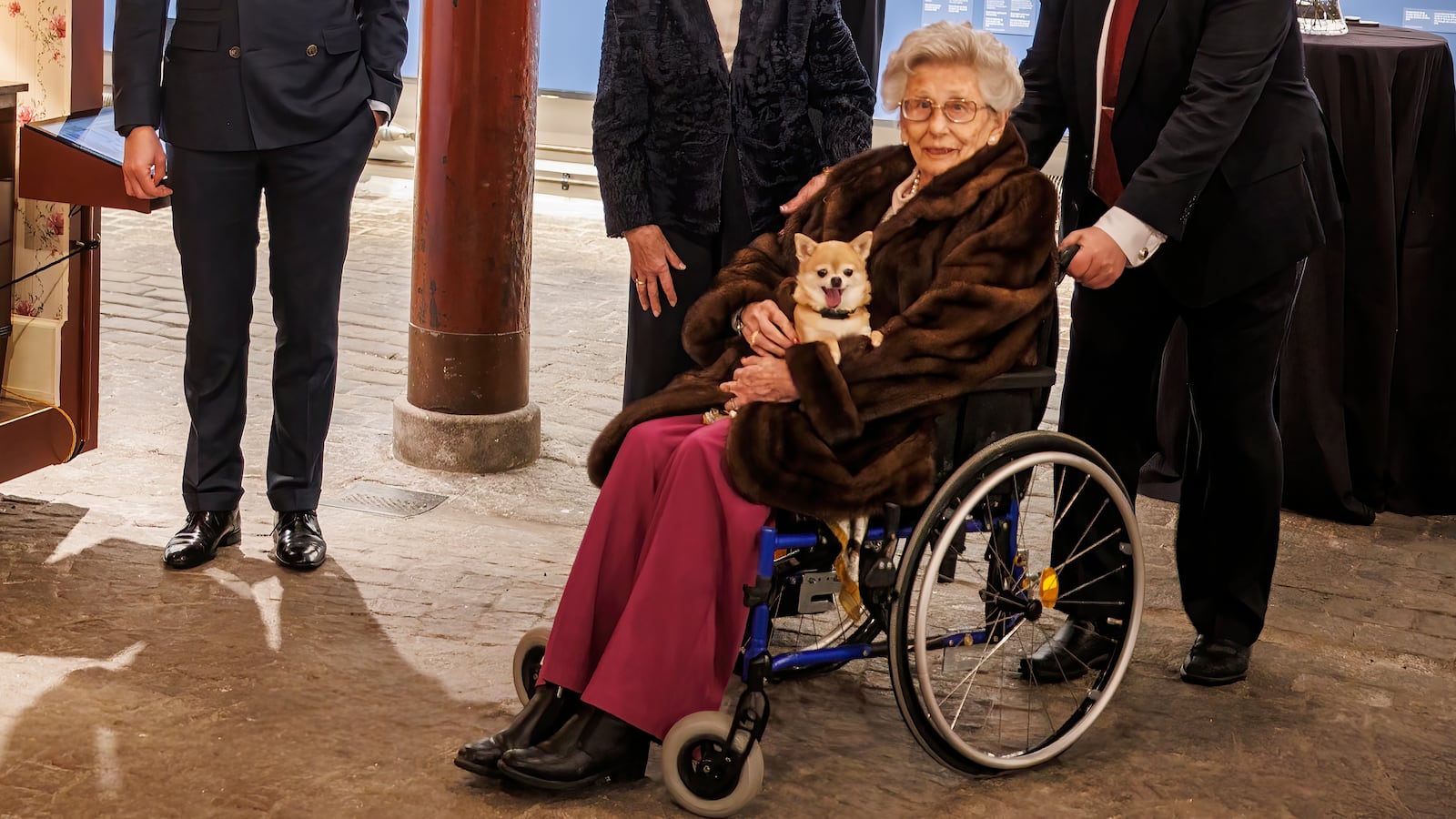 Princess Astrid attends the Opening of the "Royal Photographers" Exhibition with her rescue dog at The Queen Sonja Art Stable on February 15, 2024 in Oslo, Norway.