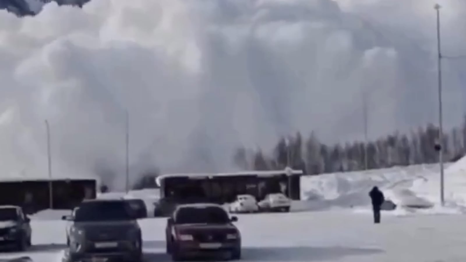 Shot of an avalanche coming down the mountain.
