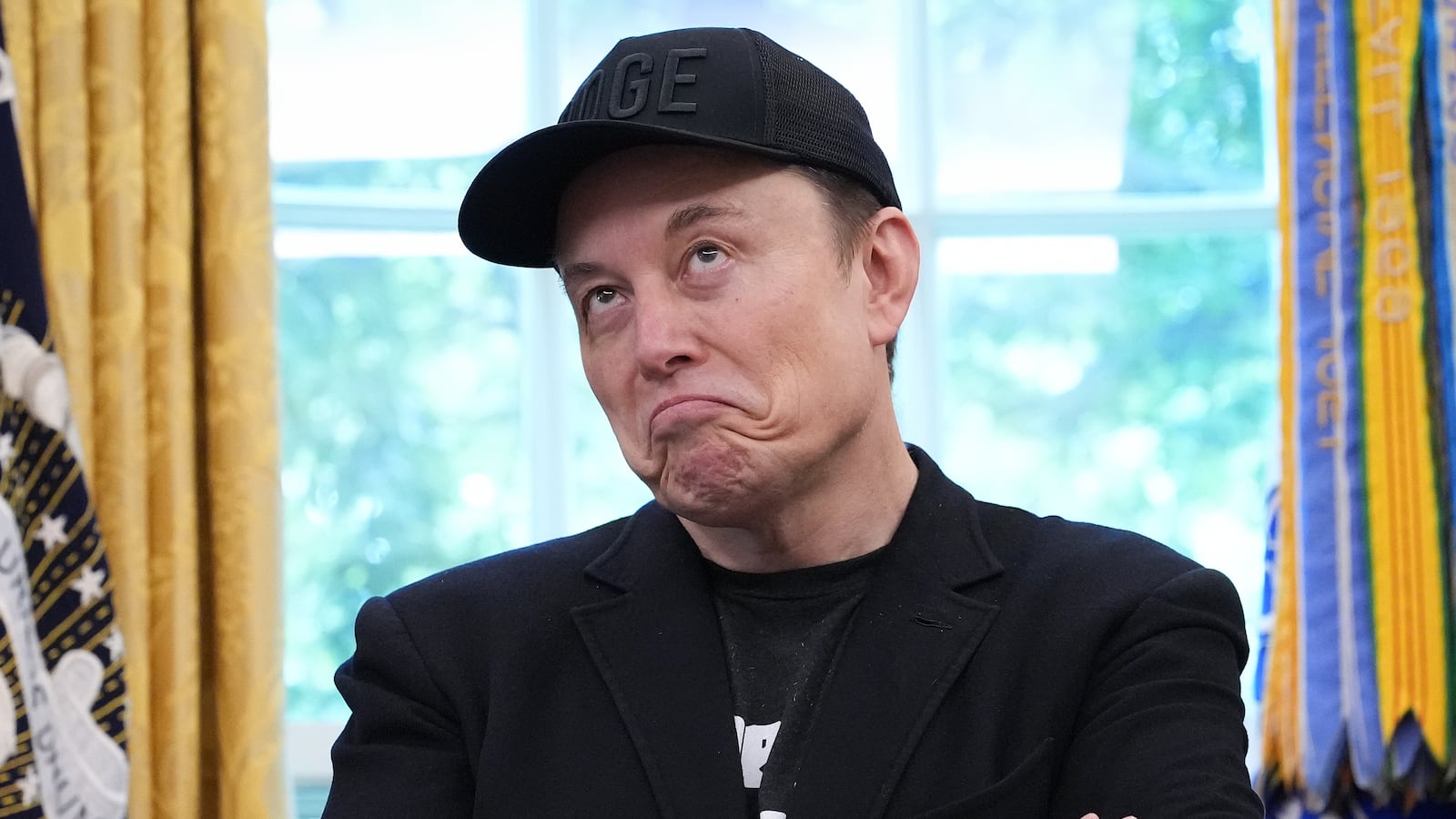 WASHINGTON, DC - MAY 30: Tesla CEO Elon Musk speaks alongside U.S. President Donald Trump to reporters in the Oval Office of the White House on May 30, 2025 in Washington, DC. Musk, who served as an adviser to Trump and led the Department of Government Efficiency, announced he would leave his role in the Trump administration to refocus on his businesses. (Photo by Kevin Dietsch/Getty Images)