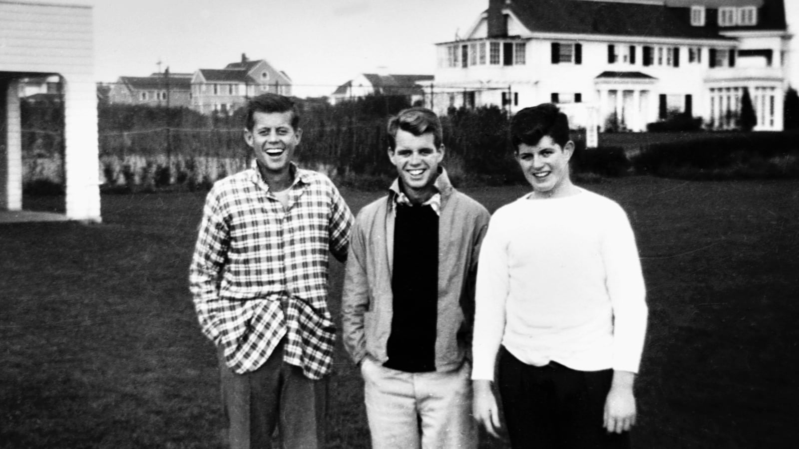 Three of the Kennedy brothers, John, Robert and Ted in their teens, stand together at their family compound in Hyannisport. (Photo by © CORBIS/Corbis via Getty Images)