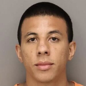 Taj Malik Taylor told fellow flyers in his row that his computer was an explosive before they immediately informed the crew, according to an FBI affidavit.