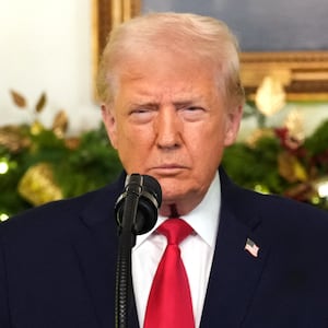 US President Donald Trump addresses the nation from the Diplomatic Reception Room of the White House in Washington, DC, on December 17, 2025.