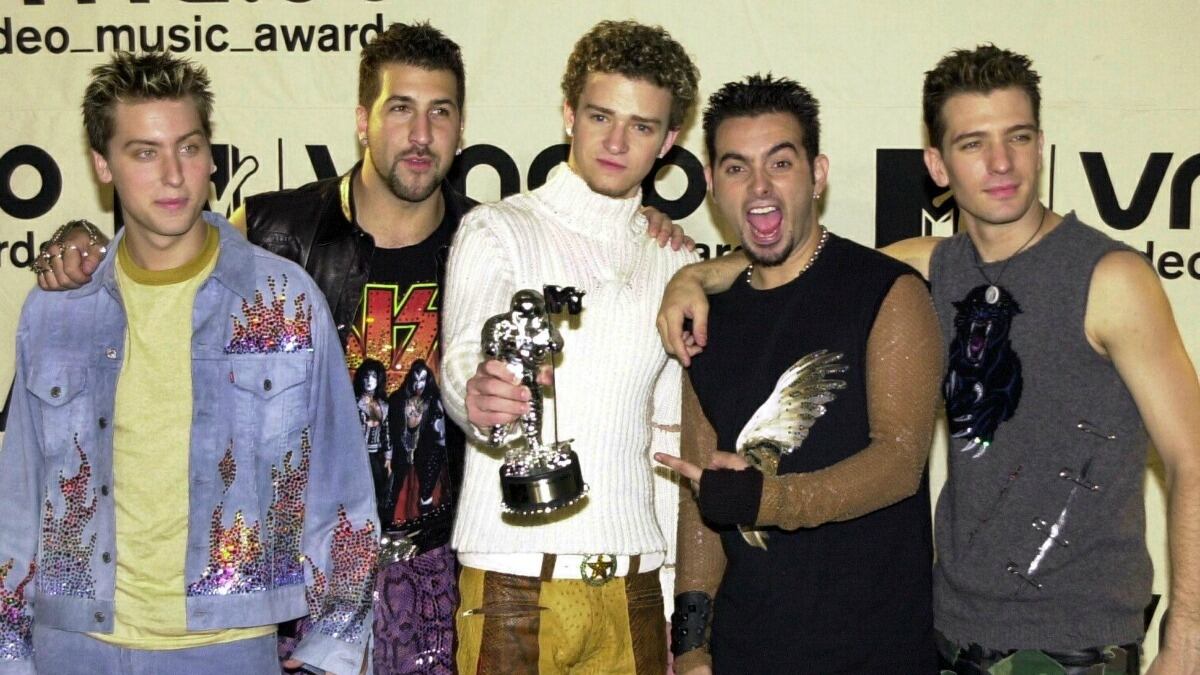 articles/2013/08/20/nsync-may-reunite-at-the-vmas-everything-we-want-from-their-performance/NSYNC-reunion-tease_hd66w8