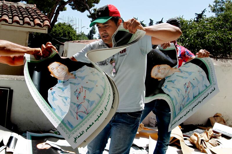 articles/2011/08/23/libya-news-gaddafi-s-defeat-raises-new-questions/gaddafi-fall-carter_phagei